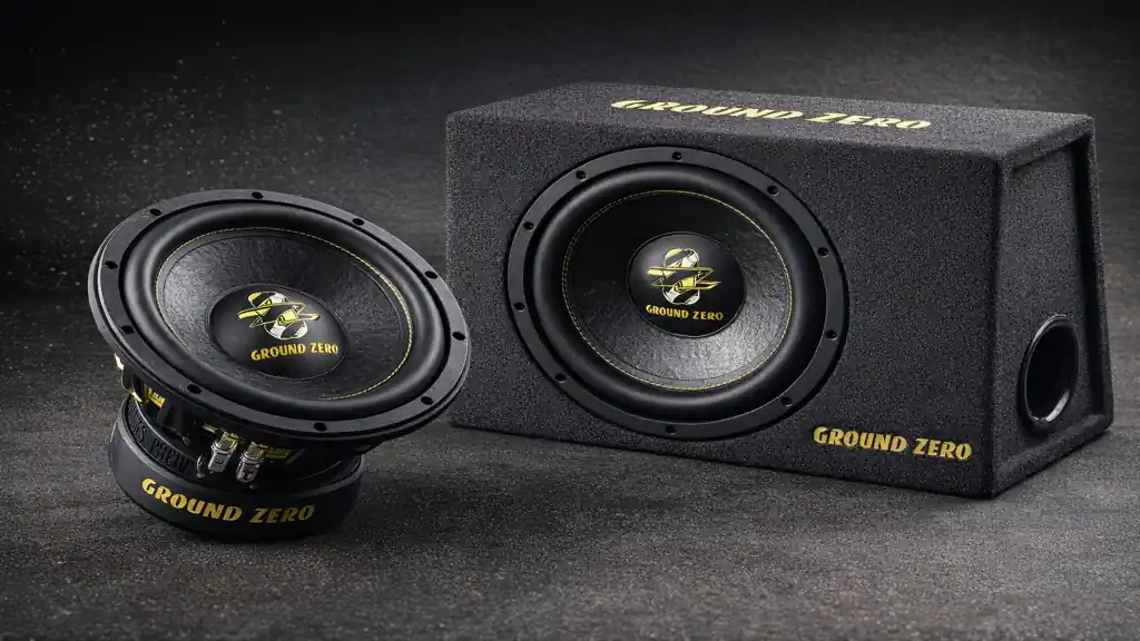 Subwoofer Ground Zero 30 cm avec caisson bass-reflex illustrant une installation car audio haute puissance pour voiture